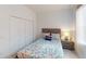 Cozy bedroom with a queen-size bed and built-in closet at 2009 Mackerel St, Port Charlotte, FL 33953