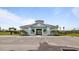 Community building with ample parking and gated entry at 2009 Mackerel St, Port Charlotte, FL 33953