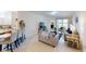 Open living room with comfortable seating and a view of the pool at 2009 Mackerel St, Port Charlotte, FL 33953