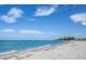 Expansive beach view with clear water and blue sky at 201 Auburn Woods Cir, Venice, FL 34292