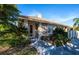 Community clubhouse building with landscaping at 201 Auburn Woods Cir, Venice, FL 34292
