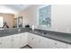 Small community kitchen with sink and cabinets at 201 Auburn Woods Cir, Venice, FL 34292