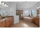 Elegant bathroom with a soaking tub and double vanity at 20450 Passagio Dr, Venice, FL 34293