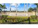 Grand Paradiso community entrance with landscaping and signage at 20450 Passagio Dr, Venice, FL 34293