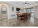 Spacious dining room with a large table, perfect for Gathering gatherings at 20450 Passagio Dr, Venice, FL 34293