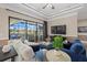 Gathering room with sliding glass doors opening to the backyard at 20450 Passagio Dr, Venice, FL 34293