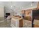 Gourmet kitchen boasts granite countertops and stainless steel appliances at 20450 Passagio Dr, Venice, FL 34293
