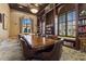 Elegant community library with a large table and built-in bookshelves at 20450 Passagio Dr, Venice, FL 34293