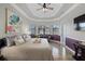 Luxurious main bedroom with bay window and sitting area at 20450 Passagio Dr, Venice, FL 34293