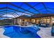 Luxury pool and lanai with outdoor kitchen at 20450 Passagio Dr, Venice, FL 34293