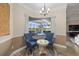 Cozy sitting area with a view of the pool and lanai at 20450 Passagio Dr, Venice, FL 34293