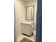 Clean bathroom with single sink vanity and tiled floor at 244 Saint Augustine Ave # 805, Venice, FL 34285