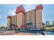 Condo building with red roof, ample parking, and a desirable location at 244 Saint Augustine Ave # 805, Venice, FL 34285