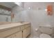 Clean bathroom with updated vanity and toilet at 2542 Northway Dr, Venice, FL 34292