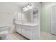 Bathroom with vanity, toilet, shower, and mirrored medicine cabinet at 2542 Northway Dr, Venice, FL 34292