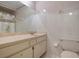Clean bathroom with updated vanity and toilet at 2542 Northway Dr, Venice, FL 34292