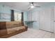 Bedroom with mountain mural, sofa bed, and white board at 2542 Northway Dr, Venice, FL 34292