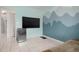 Spacious bonus room with large TV and mini-fridge at 2542 Northway Dr, Venice, FL 34292
