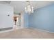 Dining room with a view of the kitchen and a chandelier at 2542 Northway Dr, Venice, FL 34292