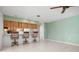 Kitchen with breakfast bar and wood cabinets at 2542 Northway Dr, Venice, FL 34292
