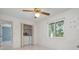 Laundry room with washer, dryer, and built-in shelving at 2542 Northway Dr, Venice, FL 34292