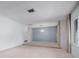 Spacious living room with light blue walls and a chandelier at 2542 Northway Dr, Venice, FL 34292