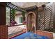Covered patio with brick and wood details at 2542 Northway Dr, Venice, FL 34292