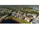 House situated on a lakefront lot in a residential community at 2558 Hobblebrush Dr, North Port, FL 34289