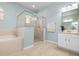 Bathroom with a soaking tub and walk-in shower at 2558 Hobblebrush Dr, North Port, FL 34289