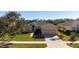 One-story house with a two-car garage and landscaped yard at 2558 Hobblebrush Dr, North Port, FL 34289