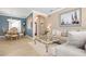 Open concept living and dining area with neutral color palette at 2558 Hobblebrush Dr, North Port, FL 34289