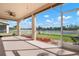 Spacious screened porch overlooking a tranquil backyard with a lake view at 2558 Hobblebrush Dr, North Port, FL 34289