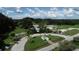 Aerial view of Warm Mineral Springs Park, highlighting the main building and parking area at 2899 Ensenada Ln, North Port, FL 34286
