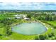 Aerial view of Warm Mineral Springs Park, showcasing the main pool and surrounding landscape at 2899 Ensenada Ln, North Port, FL 34286