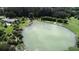 Aerial view of a natural spring, ideal for swimming and relaxation at 2899 Ensenada Ln, North Port, FL 34286