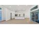 Modern kitchen with white cabinets, stainless steel appliances, and an island at 2899 Ensenada Ln, North Port, FL 34286