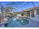 Relaxing kidney-shaped pool with screened enclosure at 2899 Ensenada Ln, North Port, FL 34286