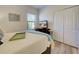 Serene bedroom with a queen bed and a view at 295 Cassano Drive, Nokomis, FL 34275