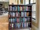 Community clubhouse with multiple books available for residents at 295 Cassano Drive, Nokomis, FL 34275