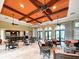 Spacious community clubhouse with seating areas and high ceilings at 295 Cassano Drive, Nokomis, FL 34275