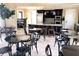 Fully equipped community kitchen with island and dining tables at 295 Cassano Drive, Nokomis, FL 34275