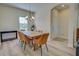 Dining room features a wood table and six chairs at 295 Cassano Drive, Nokomis, FL 34275