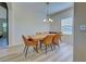 Spacious dining area with light walls and hardwood floors at 295 Cassano Drive, Nokomis, FL 34275