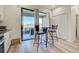 Kitchen features a breakfast nook with patio access at 295 Cassano Drive, Nokomis, FL 34275