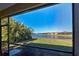 Enjoy the lake view from this screened patio at 295 Cassano Drive, Nokomis, FL 34275