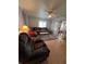 Spacious living room with comfortable seating and sliding door at 356 Longwood Dr, Venice, FL 34285