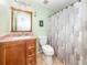 Updated bathroom with granite countertop and modern fixtures at 380 Three Lakes Ln # F, Venice, FL 34285