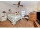 Spacious bedroom with ample natural light and ceiling fan at 380 Three Lakes Ln # F, Venice, FL 34285