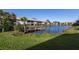 Waterfront property with private dock and lush scenery at 380 Three Lakes Ln # F, Venice, FL 34285