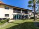 Condo with private patio and lush landscaping at 380 Three Lakes Ln # F, Venice, FL 34285